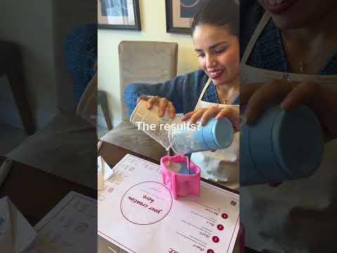 Guest creating and unmolding a handmade candle vessel at a Set & Melt private workshop in Orlando
